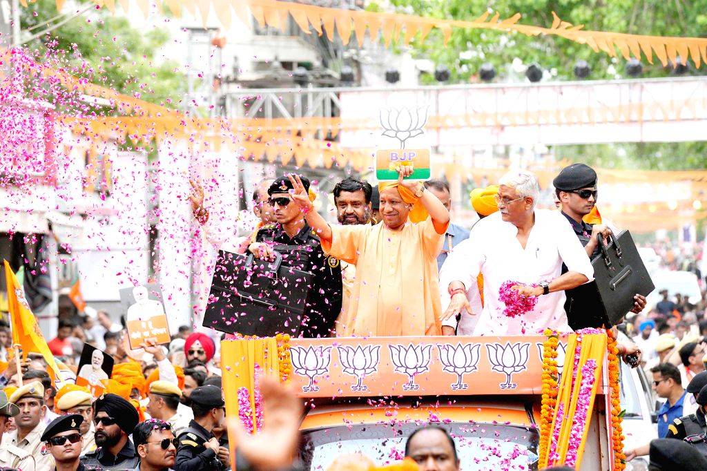 Uttar Pradesh Chief Minister Yogi Adityanath holds a roadshow amid Lok ...