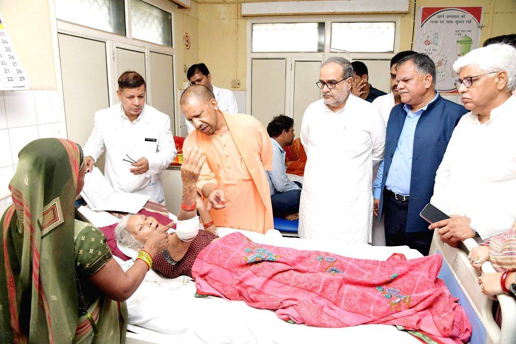 Uttar Pradesh Chief Minister Yogi Adityanath meets the victims of the ...