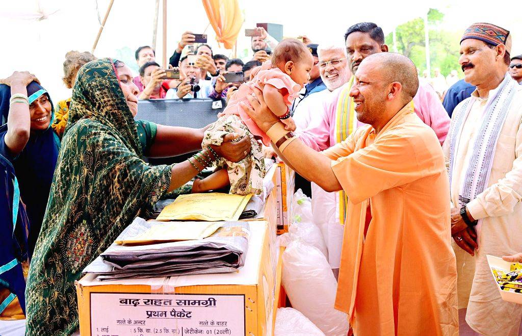 Uttar Pradesh Chief Minister Yogi Adityanath meets with the flood ...