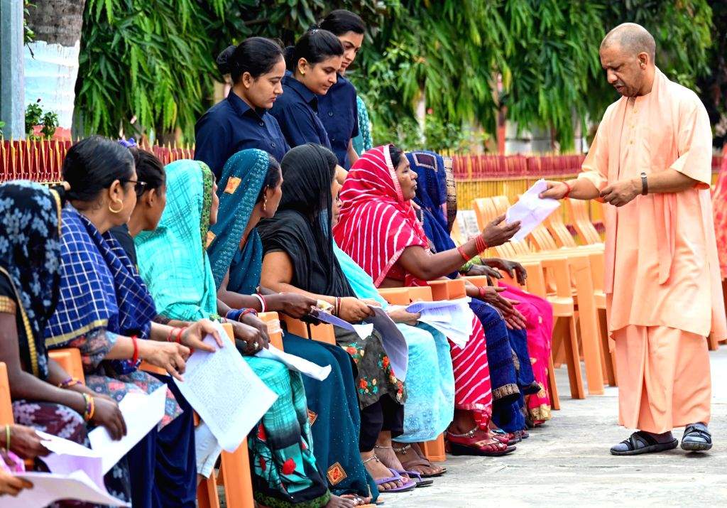 Uttar Pradesh Chief Minister Yogi Adityanath interacts with the public
