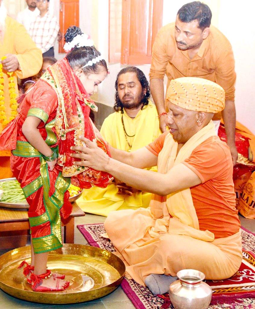 Uttar Pradesh Chief Minister Yogi Adityanath performs 'Kanya Pujan