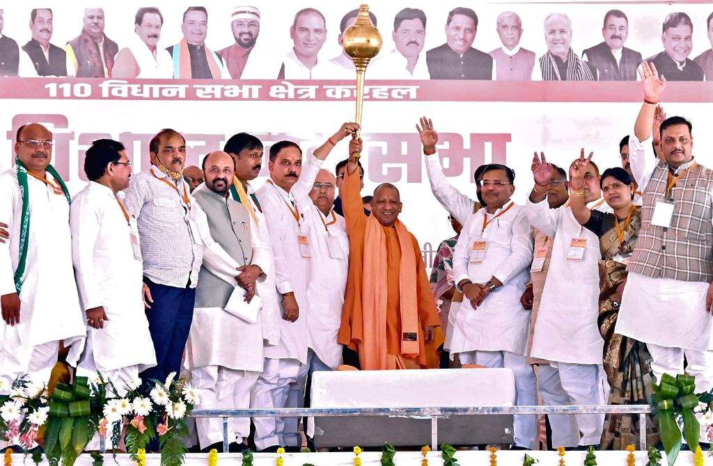 Uttar Pradesh Chief Minister Yogi Adityanath addresses an election ...