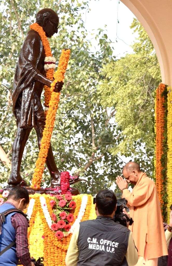 Uttar Pradesh Chief Minister Yogi Adityanath pays tributes to Mahatma ...