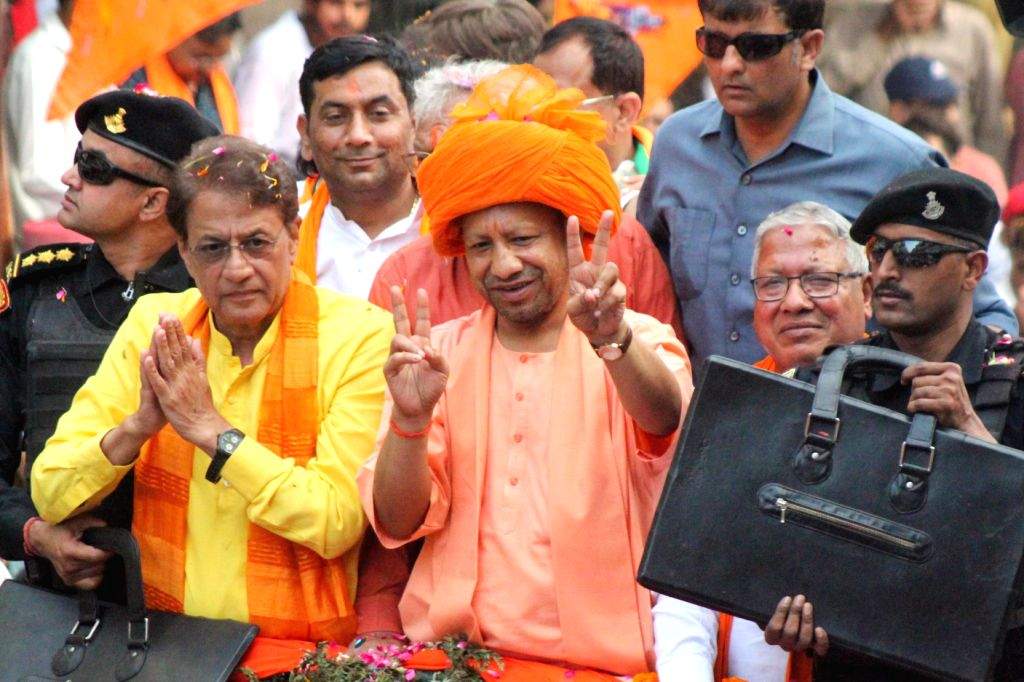 Uttar Pradesh Chief Minister Yogi Adityanath with BJP candidate Arun ...