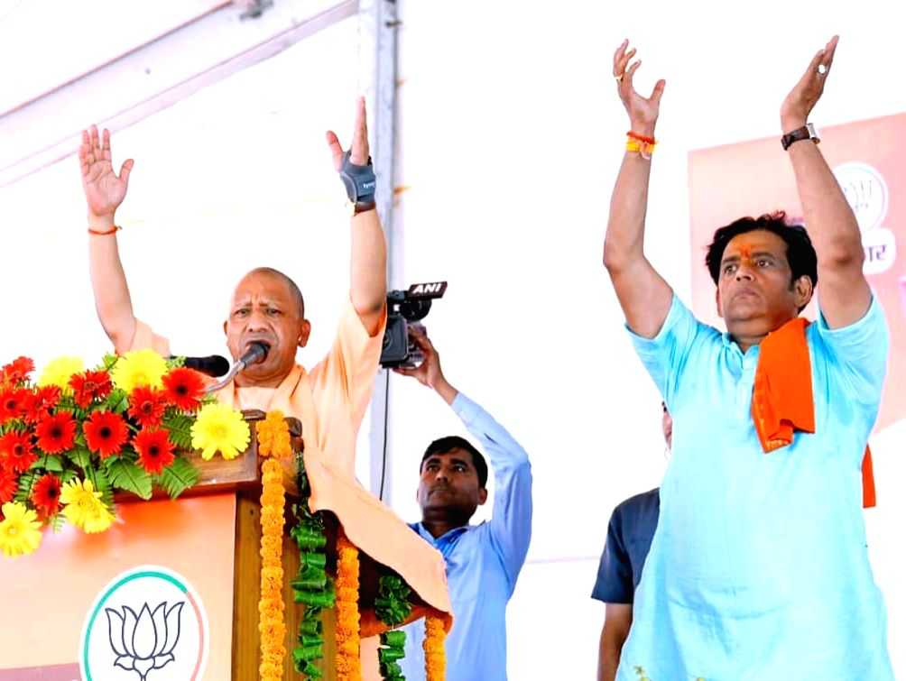 Uttar Pradesh Chief Minister Yogi Adityanath with BJP candidate Ravi ...