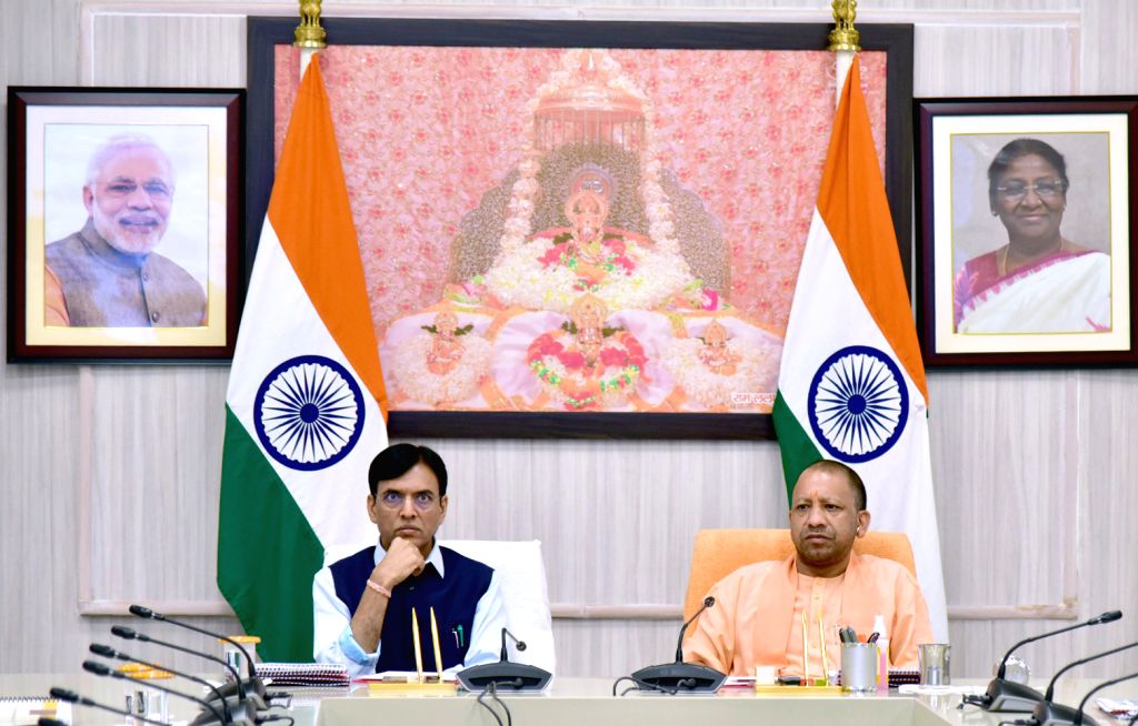 Uttar Pradesh CM Yogi Adityanath and Union Health Minister Mansukh ...