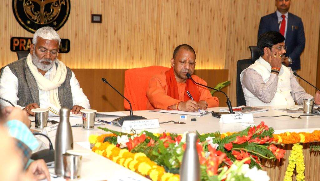 Uttar Pradesh CM Yogi Adityanath chairs a meeting with officials to ...