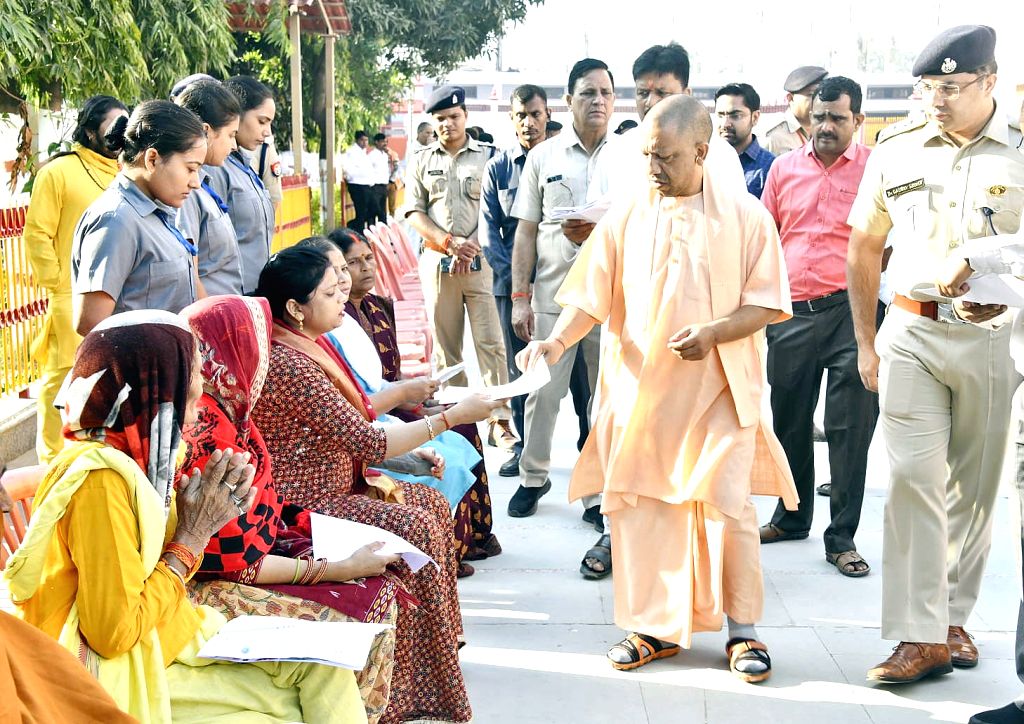 Uttar Pradesh CM Yogi Adityanath interacts with people during 'Janata ...