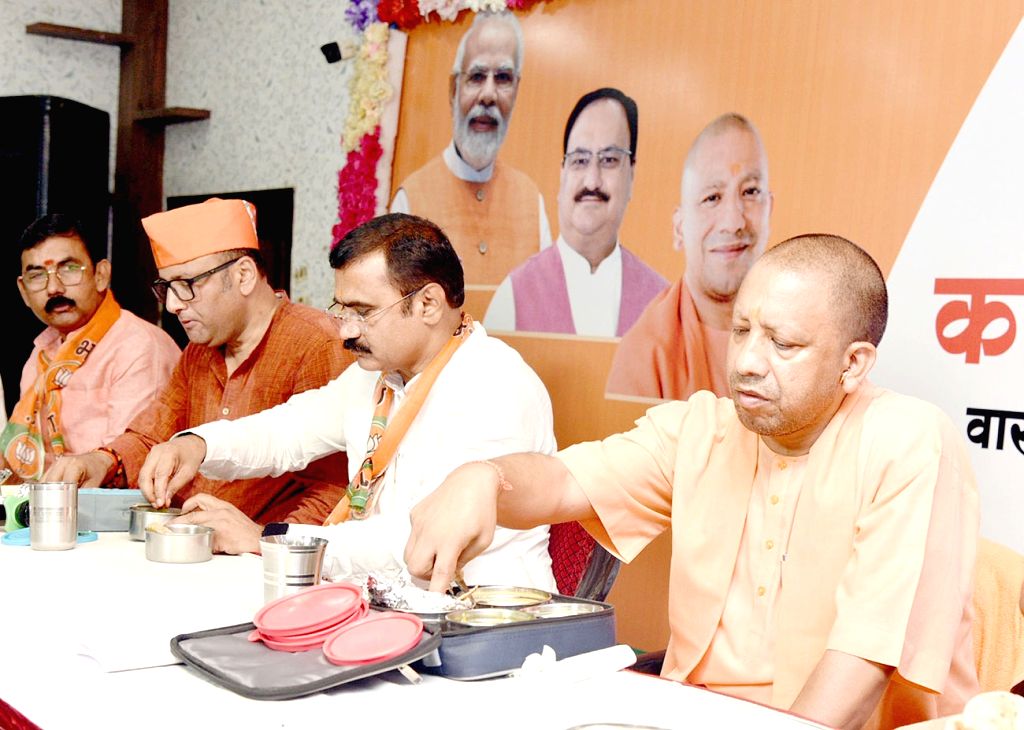 Varanasi : Uttar Pradesh Chief Minister Yogi Adityanath during a party ...