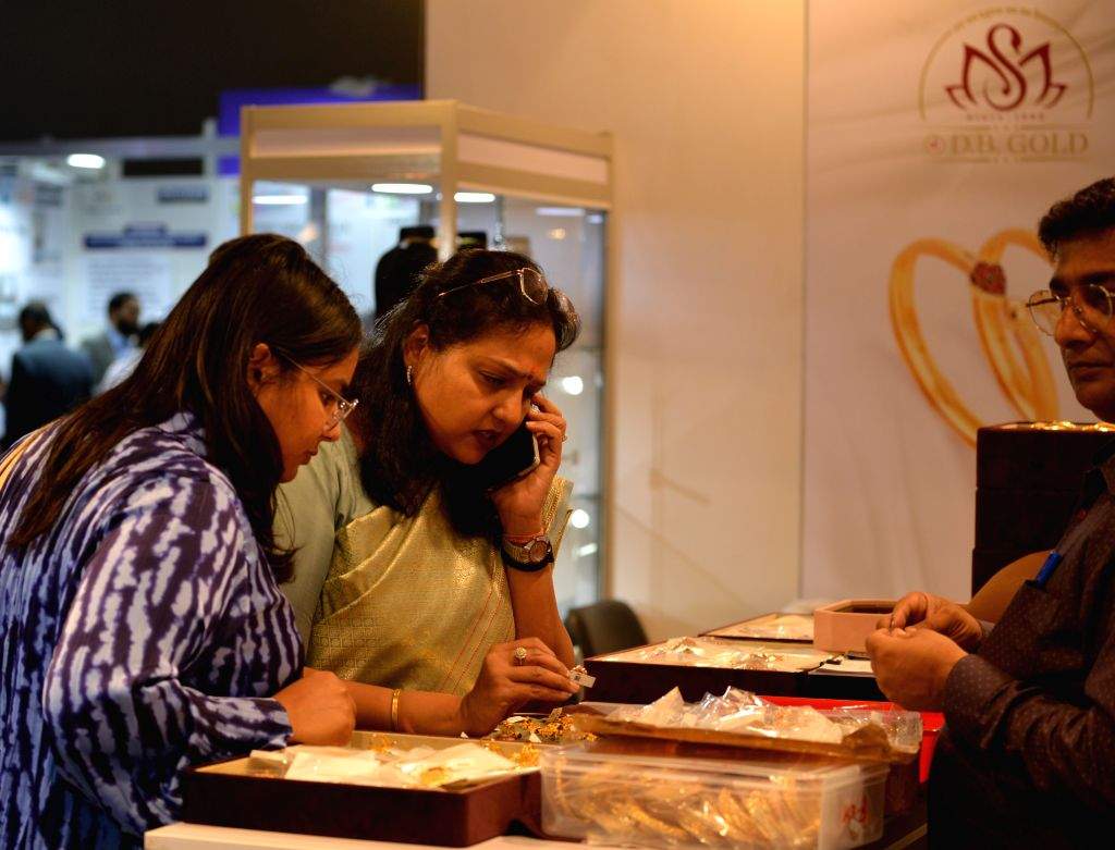 Visitors explore and select jewellery at the DJGF Signature 2025 ...