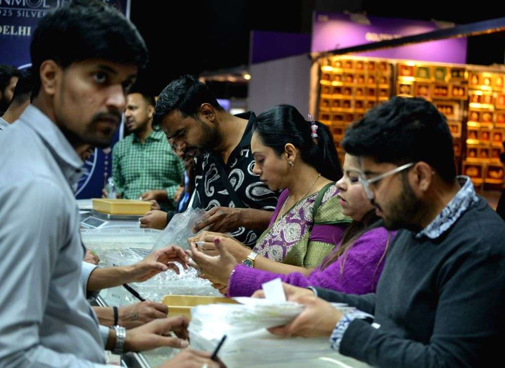 Visitors explore and select jewellery at the DJGF Signature 2025 ...