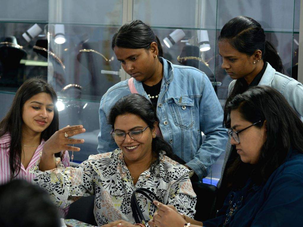 Visitors explore and select jewellery at the DJGF Signature 2025 ...