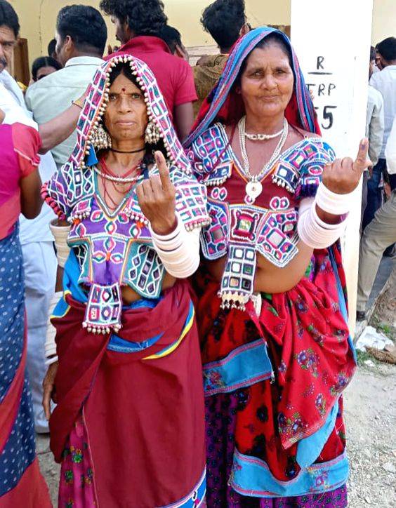 Voters Show Their Fingers Marked With Indelible Ink After Casting Vote