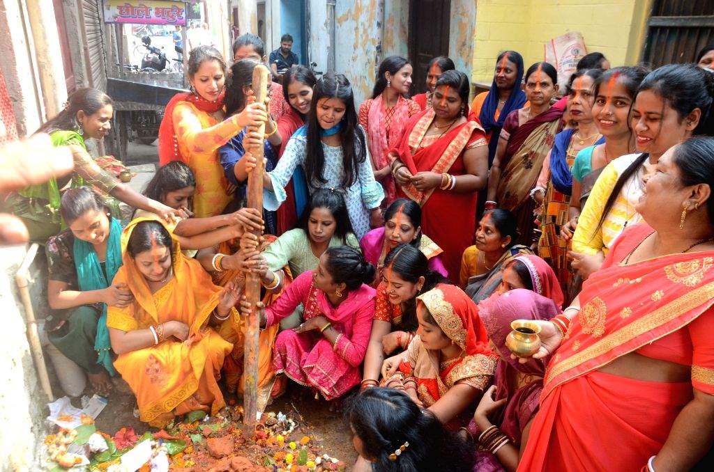 Women perform rituals on the occasion of the 'Bhai Dooj' festival