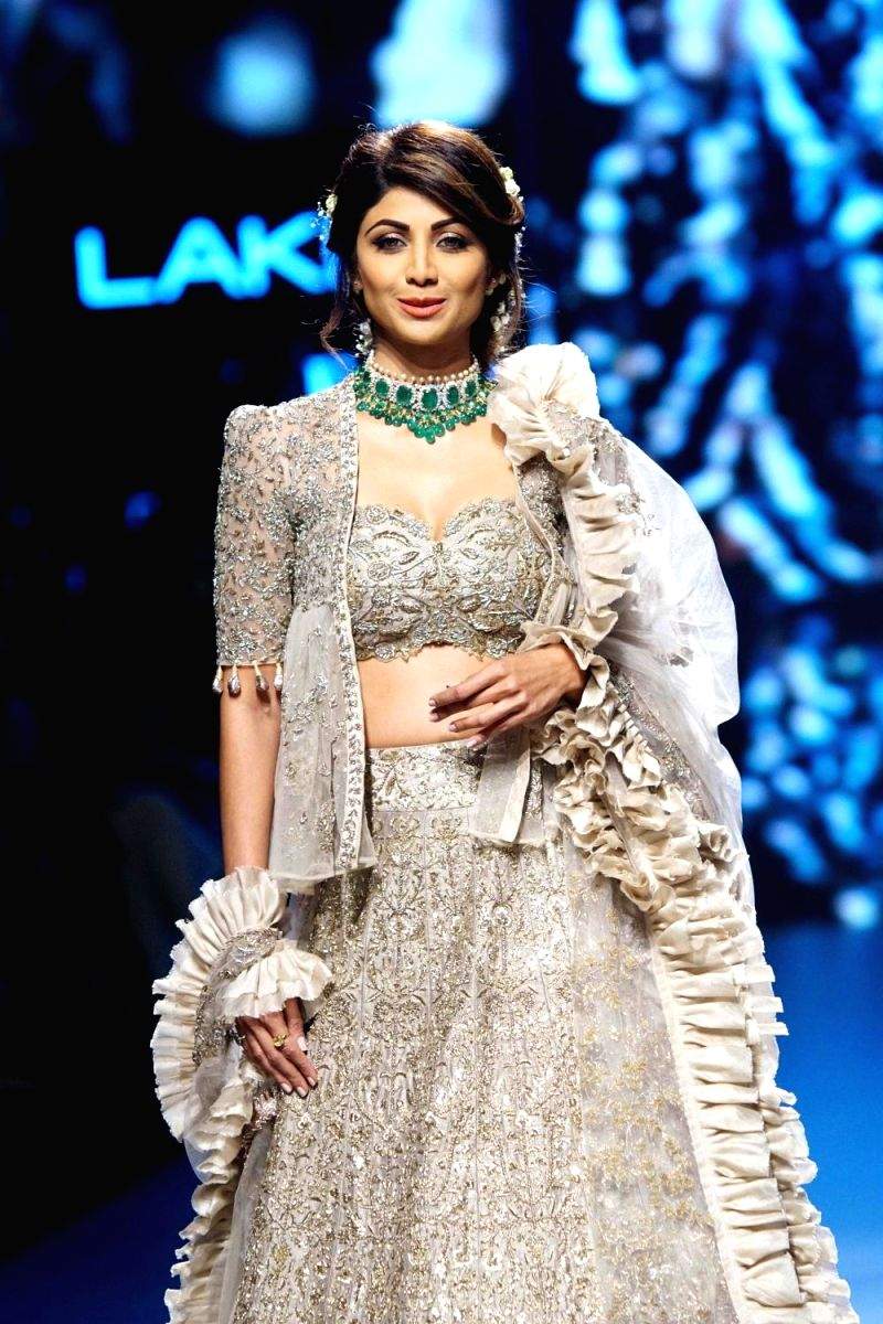 shilpa shetty dress designer name Shilpa Shetty in Handwoven Beige Tissue Saree