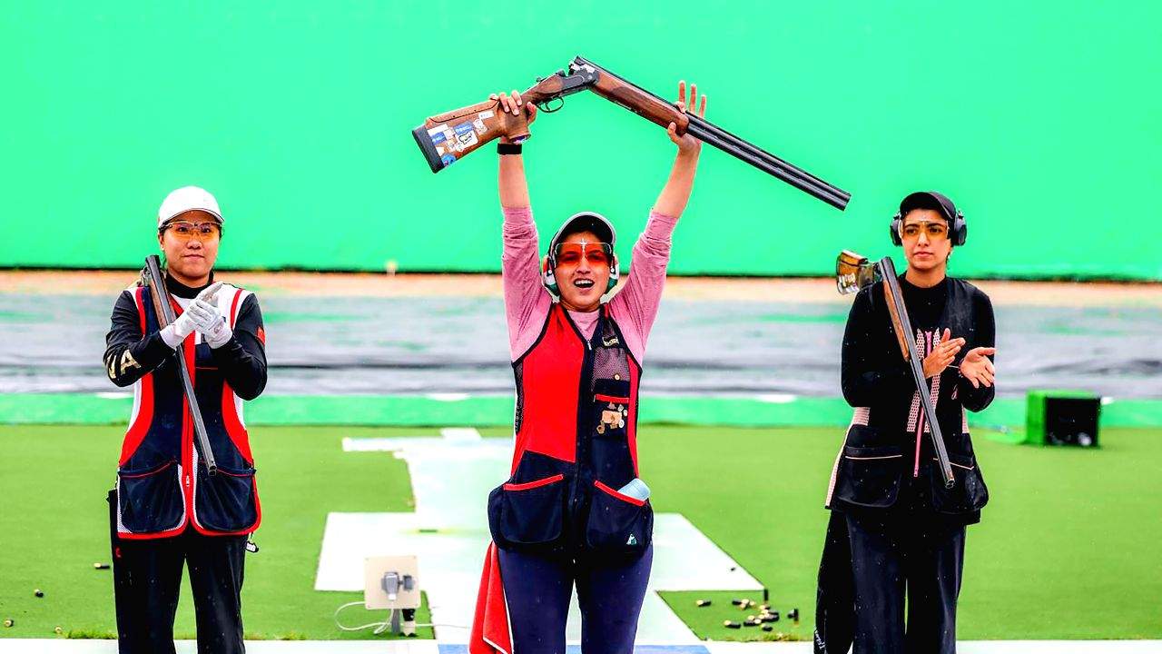 India's Neeru Dhanda celebrates after winning the gold medal