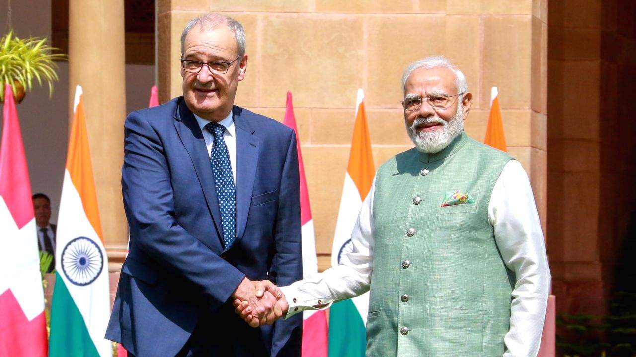  Prime Minister Narendra Modi shakes hands with President of the Swiss Confederation Guy Parmelin