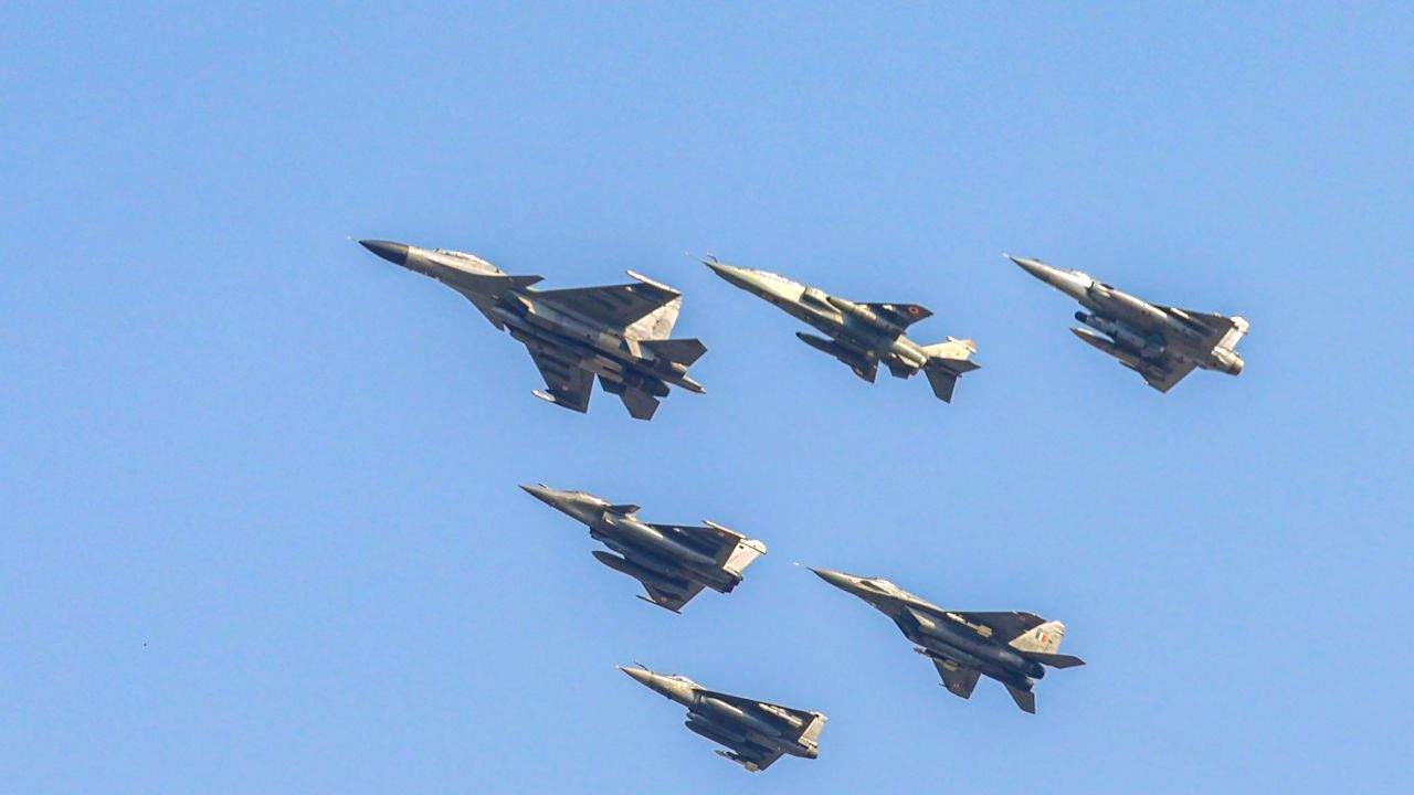 Varanasi: Indian Air Force's Su-30MKI, Rafale, Jaguar, Mirage 2000, LCA Tejas and MiG-29 fighter aircraft fly past in a formation during the Indian Air Force's 'Wings over Ganges' aerial display at Namo Ghat, organised to commemorate the 94th anniversary of the Indian Air Force, in Varanasi, Uttar Pradesh, on Sunday, October 25, 2026.