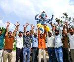 Devotees Carry Ganesha Idol Ahead of Ganesh Chaturthi