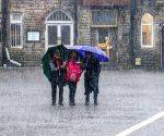 Schoolchildren Brave Heavy Rainfall