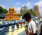 Workers Paint Kanaka Durga Temple Ahead of Dasara in Vijayawada