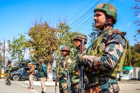 Security personnel stand guard at Kangla Gate