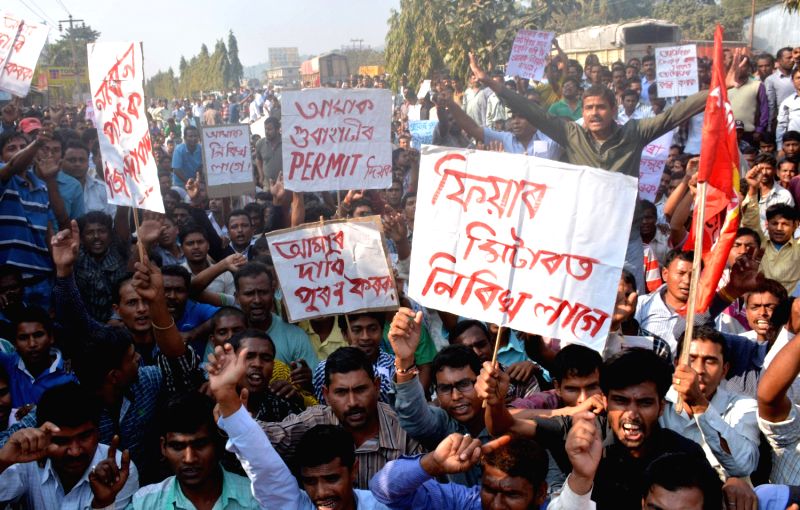 Guwahati Auto-rickshaw Drivers' Union stage a protest in front of ...